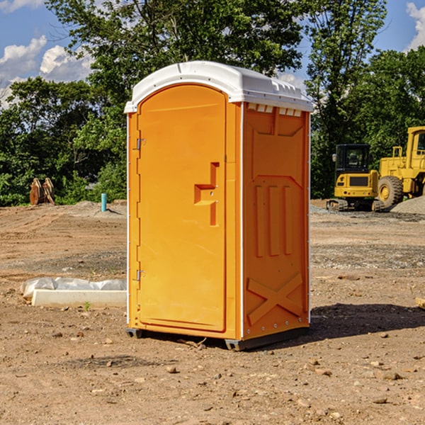 what is the cost difference between standard and deluxe portable restroom rentals in Goodman